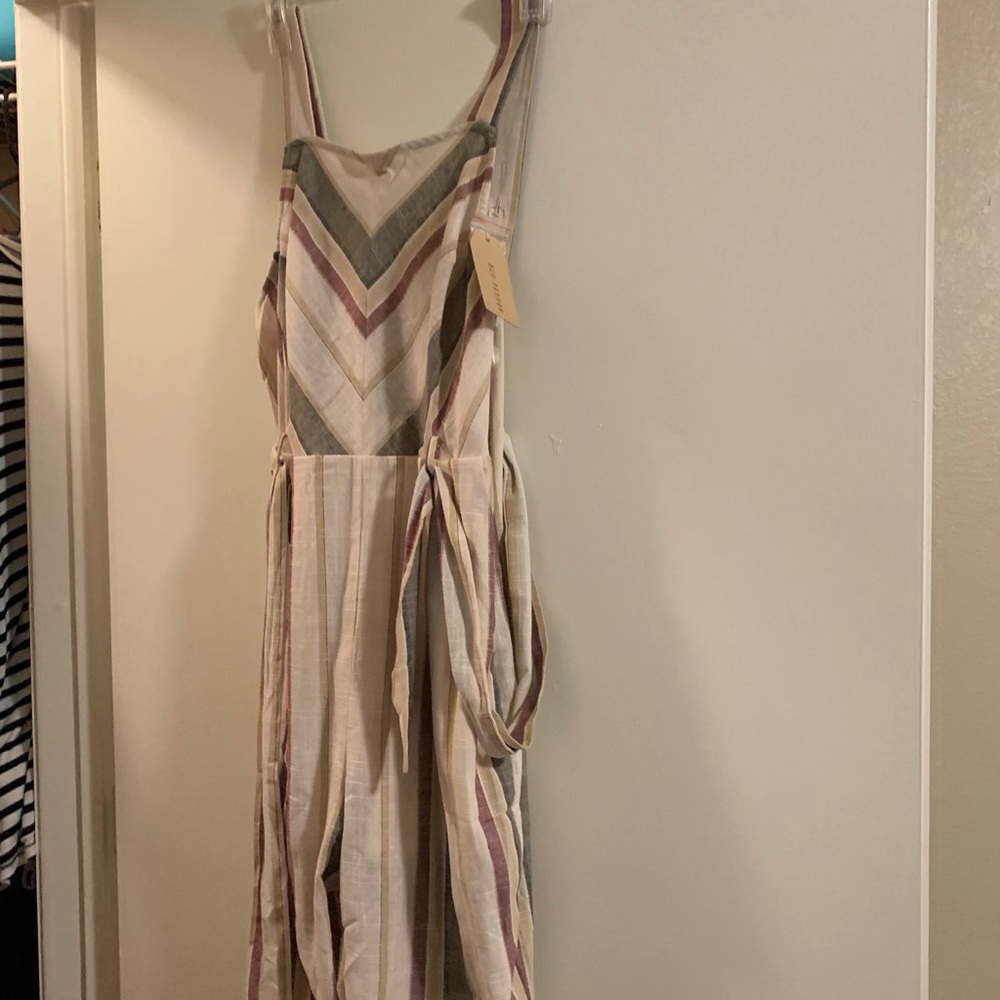 Beige jumpsuit.